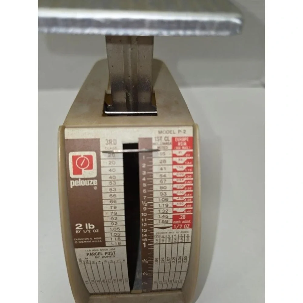 vintage Pelouze Model P-2 postal scale designed to weigh parcels up to 2 pounds.